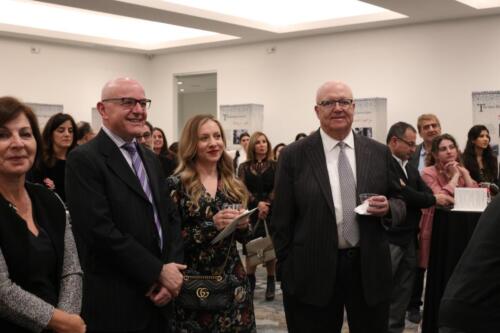 Dr. Moise Khayrallah and HOL Trustee Dr. Hanna Shammas during Dr. Khater's talk. 